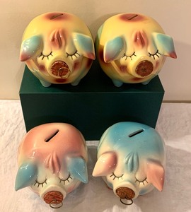 lot 2 image: Four Vintage Hull Corky Pig Vintage Banks
