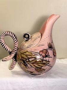 lot 31 image: Hull Pottery Blossom Teapot, Cream and Sugar (1955)
