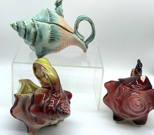 lot 36 image: Three Hull Seashell Pottery Pieces
