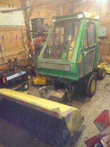 John Deere F911 Tractor, Mower, 72 in., and brush