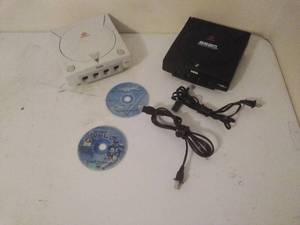 lot 65 image: Two Sega Dreamcast Consoles