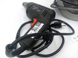 lot 002 image: Black & Decker 38 Drill & 24 Carbide Tip Circular Saw