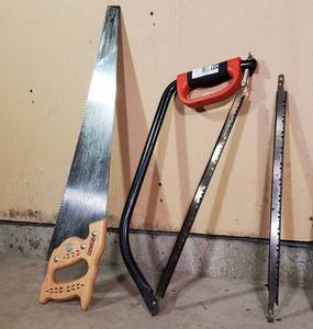 lot 034 image: Black and Decker Bow Saw with Replacement Blade and a Stanley Handsaw