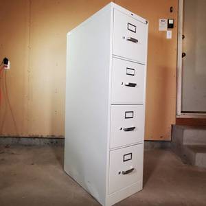 lot 062 image: Tall 4 Drawer Locking Filing Cabinet with Key