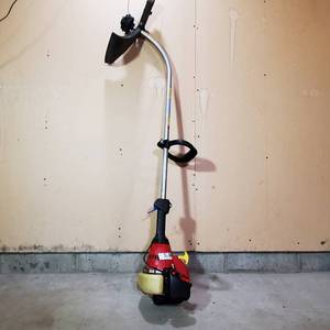 lot 157 image: Homelite 25cc Trim N Edge String Trimmer