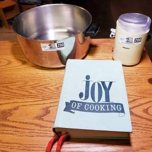 lot 200 image: Vintage Joy of Cooking Cookbook, Stainless Steel Pot, Krups Coffee Grinder, and Assorted Towels