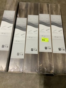 lot 17 image: 6 CASES WITH LAKESHORE PECAN BRONZE 7MM THICK X 7-23 IN. WIDE X 50-58 IN. LENGTH LAMINATE FLOORING SEE PICS