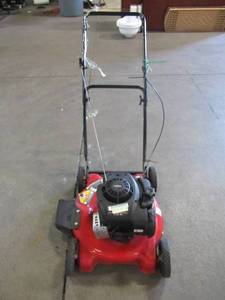 lot 12 image: Yard Machines 20 in. 125cc OHV Briggs & Stratton Gas Push Mower 11A-02BT729