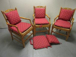 lot 412 image: ACCENT CHAIRS, WITH RATTAN SEATS, DECORATIVE WOOD FRAMES, REMOVABLE ACORN-PRINT CUSHIONS