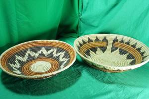 lot 129 image: Two Matching Round Woven Baskets