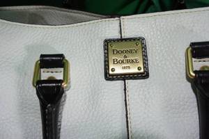 lot 34 image: Dooney & Bourke Large White Leather Purse