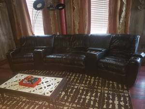 lot 67 image: Black Faux Leather Theatre Seating Sofa, Seats 4
