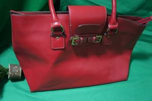 lot 49 image: Large Red Leather Purse