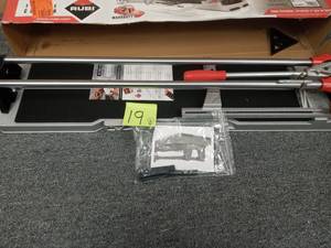 lot 19 image: Rubi 28 in. Speed-N Tile Cutter open box never used