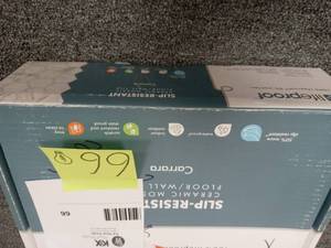 lot 66 image: LifeProof Carrara 10 in. x 12 in. x 6.35mm Ceramic Mosaic Tile not used see pictures