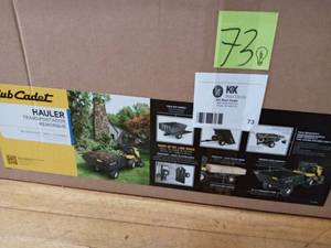 lot 73 image: Original Equipment 2-Wheel Hauler for Lawn Tractors and Zero-Turn Mowers by Cub Cadet open box never used