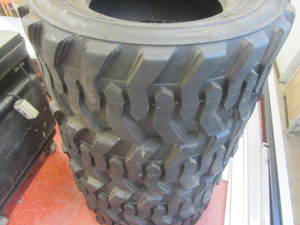 lot 7 image: Bobcat tires, set of four 12-16.5 N...