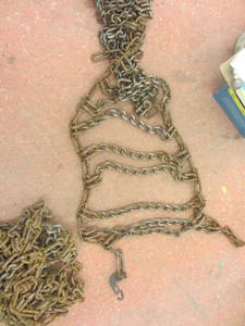 lot 50 image: Tire chains for 12-16.5 NHS, pair...