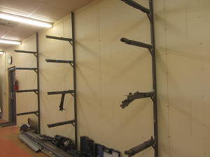 lot 55 image: Wall mount material racks, set of t...