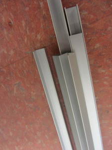 lot 128 image: Aluminum channel 12x12, approx ...