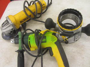 lot 194 image: DeWalt corded 4-12 angle grinder,...