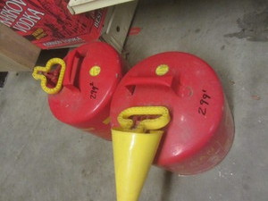 lot 299 image: Eagle gas cans...