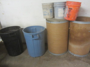lot 395 image: Trash cans - 32 gallon. Two cardboa...