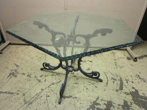 lot 333 image: PATIO TABLE, WITH DECORATIVE METAL BASE AND GLASS TOP
