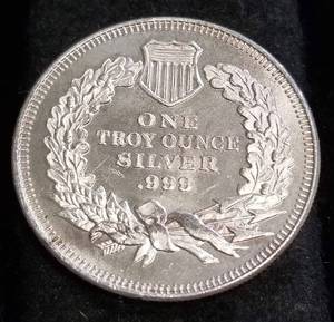 1 TROY OZ. .999 FINE SILVER SEATED DOLLAR DESIGN