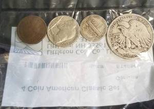 4 COINS IN SEALED LITTLETON PACKAGING AS PICTURED