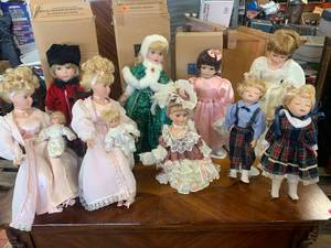 Lot of 9 Avon Christmas Dolls
