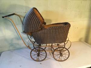 lot 204 image: Old Lloyd Loom Product Baby Carriage