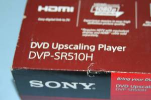 lot 74 image: New in Box Ultra Compact Sony Upscaling DVD Player Model DVP-SR510H