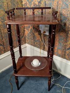 lot 50 image: Two tiered carved wood side table