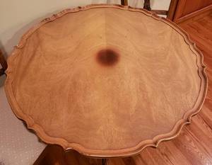 lot 14 image: wooden Eagle claw pedestal table with pie crust edge paired w 2 chairs