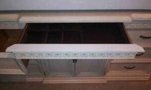 lot 32 image: White dresser with jewelry drawer in the center trim