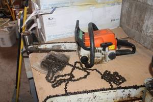 lot 809 image: Stihl Chain Saw 14 017, Extra Saw Chains