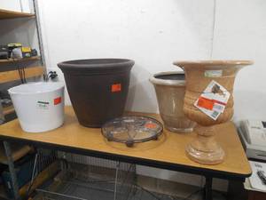 lot 86 image: (5) PLANTERS & A BASE WITH WHEELS