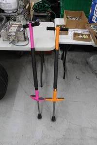 lot 466 image: Lot of (2) Super Go Pogo 88-154lbs. 469000 Pogo Sticks