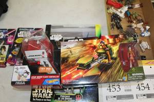 lot 455 image: Lot of (2) Hot Wheels Star Wars Flight Controller, Hasbro Ezra Bridgers Speeder Star Wars Figurine