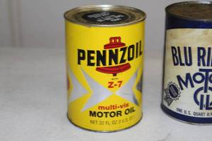 lot 521A image: Lot of (3) Vintage Motor Oil Cans with Oil - Penzoil Multi-Vis Z-7 32oz. Can, Shell X-100 Multigrade 10W-20W-40W 1-qt. Can,  Blu Ribbon Motor Oil 1-qt. Can