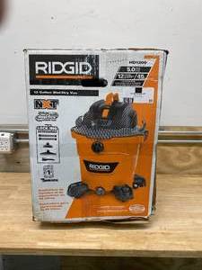 lot 23 image: RIGID 12 Gal. 5.0-Peak HP NXT WetDry Shop Vacuum with Filter, Hose and Accessories