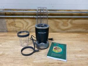 lot 56 image: NUTRIBULLET Original 24 oz. Single Speed Black Jar Blender