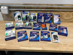 lot 92 image: CHAMBERLAIN Lot of 18 Various Garage Door Remotes
