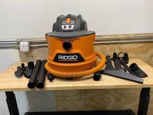lot 95 image: RIGID 14 Gal. 6.0-Peak HP NXT WetDry Shop Vacuum with Fine Dust Filter, Hose, Accessories and Premium Car Cleaning Kit