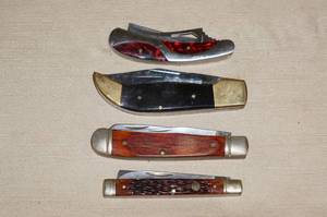 lot 129 image: 4 Folding Pocket Knives
