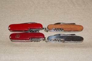 lot 130 image: 4 Multi-Tool Pocket Knives