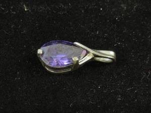 lot 36 image: Purple Teardrop Stone Pendant