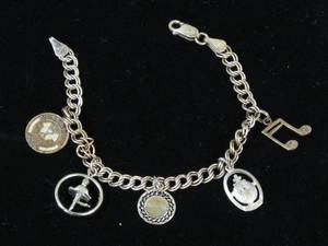 lot 44 image: Sterling Silver Charm Bracelet