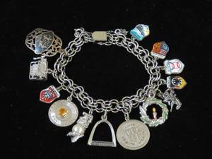 lot 46 image: Sterling Silver Charm Bracelet